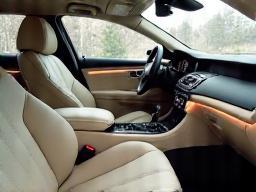 Luxurious car interior detailed with spotless surfaces and leather seats